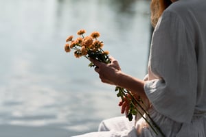 side-view-woman-holding-flowers-bouquet